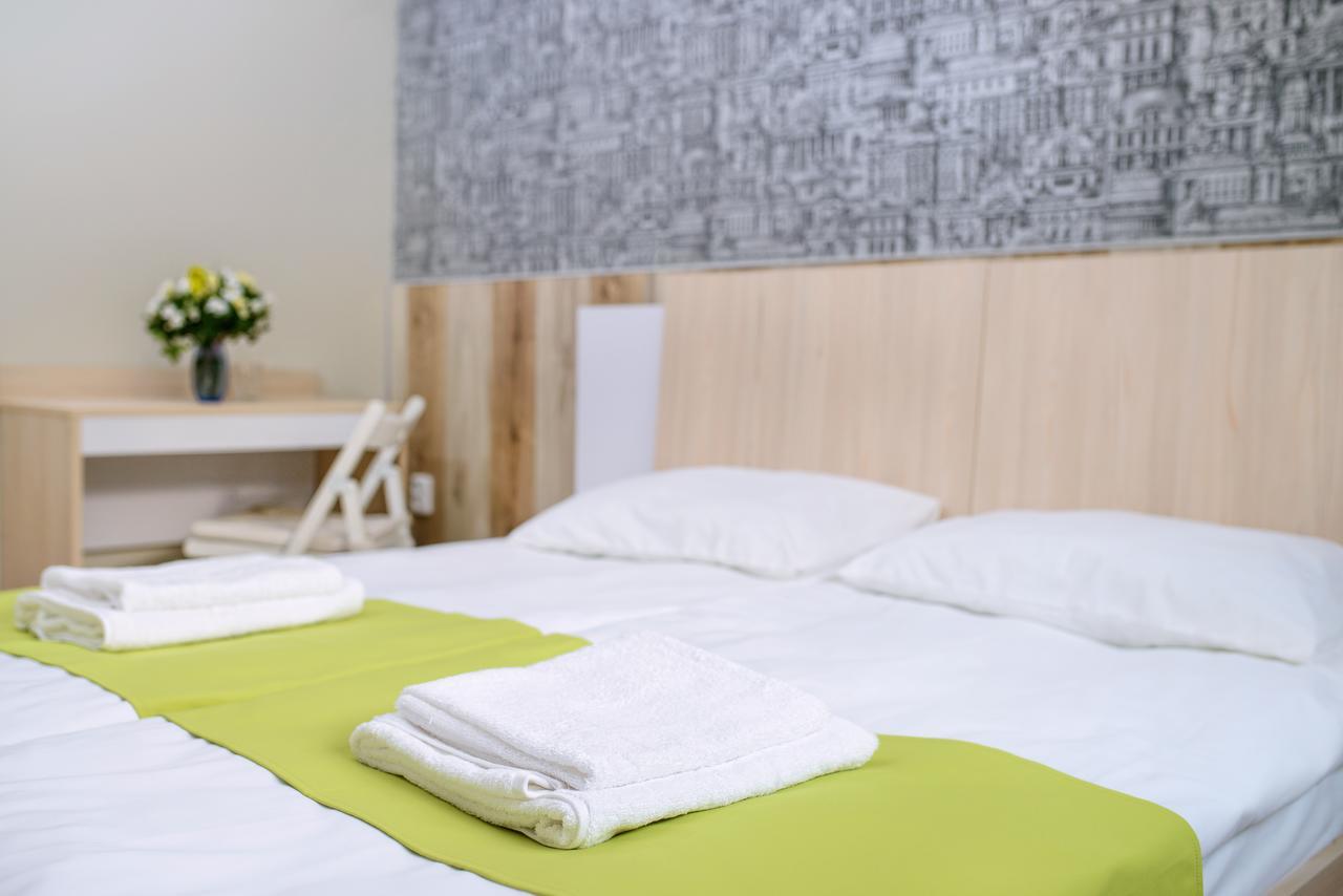 Urban Hotel Lviv Bagian luar foto